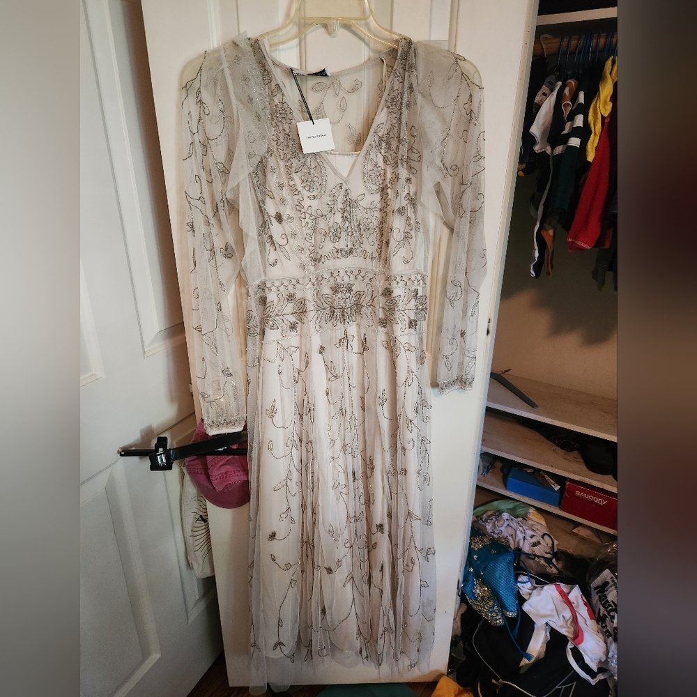 Silver beaded off-white wedding or prom dress